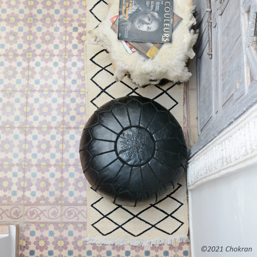 Full black Moroccan leather pouf