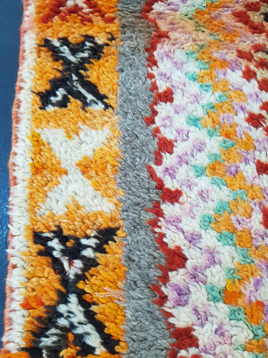 Small colorful Moroccan rug from Boujaad region