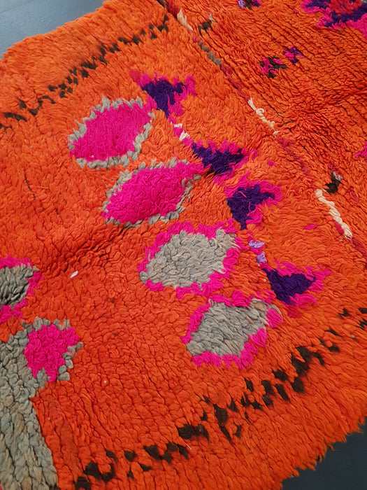Small orange Moroccan rug from Boujaad region