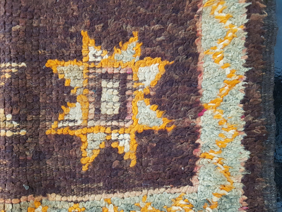Small black Moroccan rug from Boujaad region