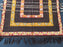 Small square black Moroccan rug from Boujaad region