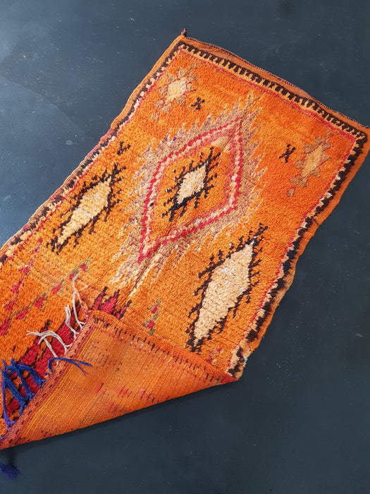 Orange Moroccan rug from Boujaad region