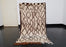 Brown and white Moroccan rug from AZILAL region