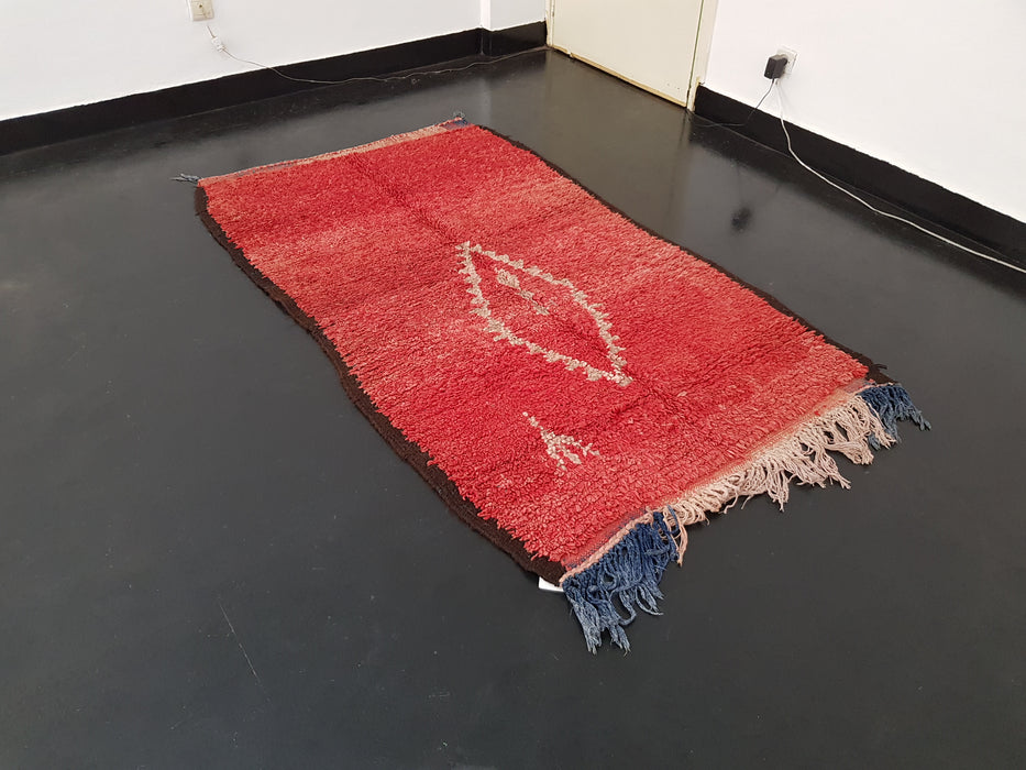 Red Moroccan rug from Boujaad region