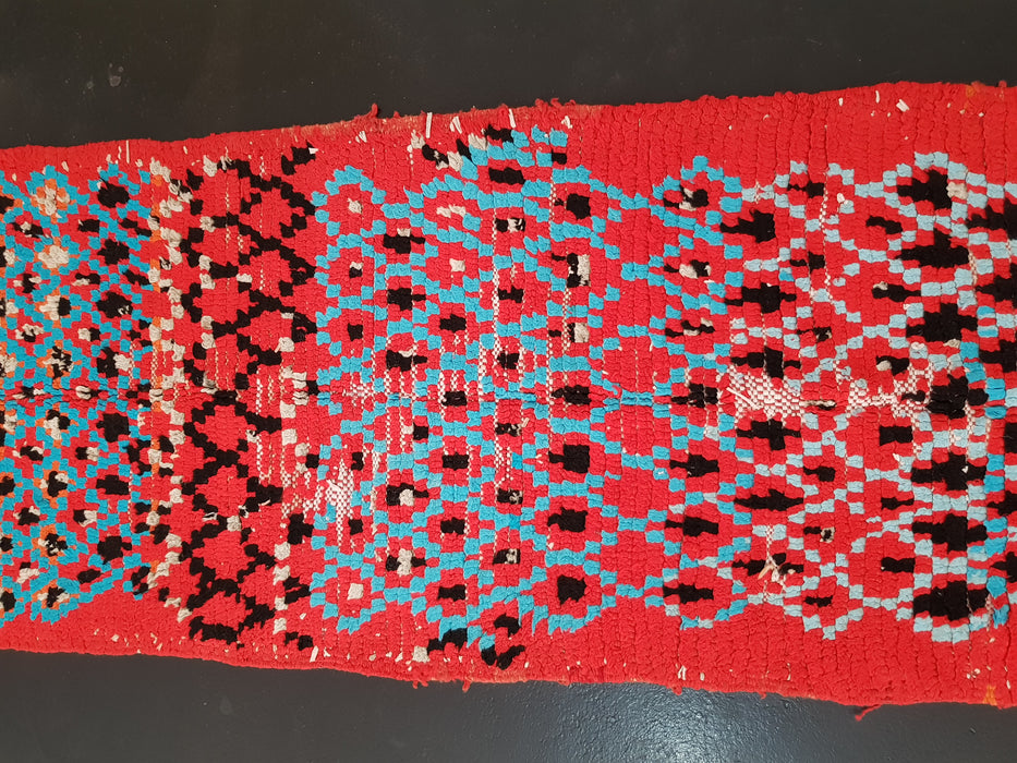 Red Moroccan runner rug from Boujaad region