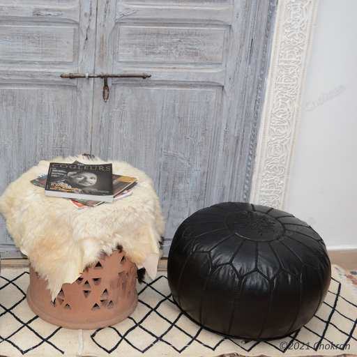 Full black Moroccan leather pouf
