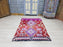 Gorgeous purple and red Moroccan rug from Boujaad region